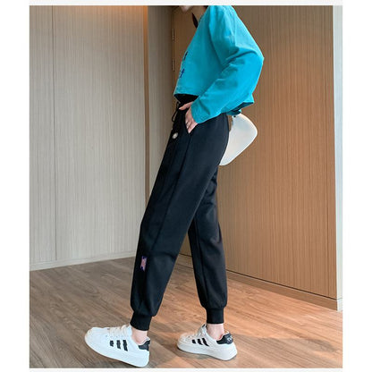 Pantalones deportivos rectos de talla grande y corte holgado para adelgazar