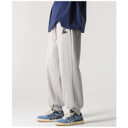 Pantalon de survêtement ample en tricot tendance, droit et polyvalent.