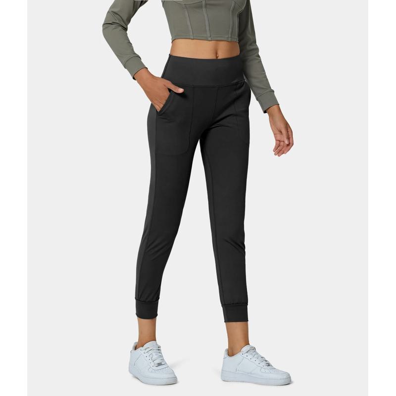 Pantalon de sport fuselé avec poches pour fitness, yoga et course à pied en extérieur.
