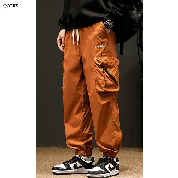 Pantalones de carga informales con ajuste elástico y corte holgado y delgado.
