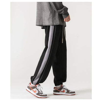 Pantalones casuales de punto de pierna ancha con corte recto y cintura ajustable tipo deportivo