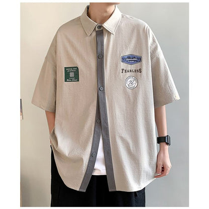 Camisa de manga corta versátil con estampado de bloques de color de moda para el trabajo
