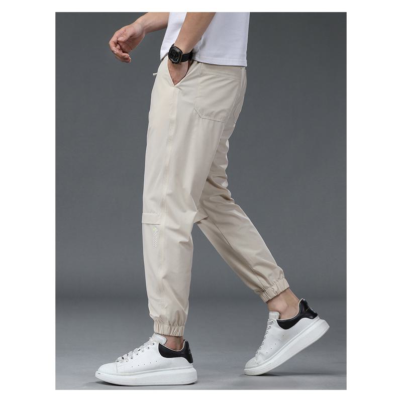 Pantalones elásticos de moda y sueltos con corte recto y ajuste cónico