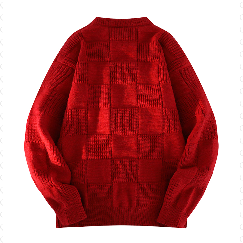 Pull ample en tricot à col rond et design simple.