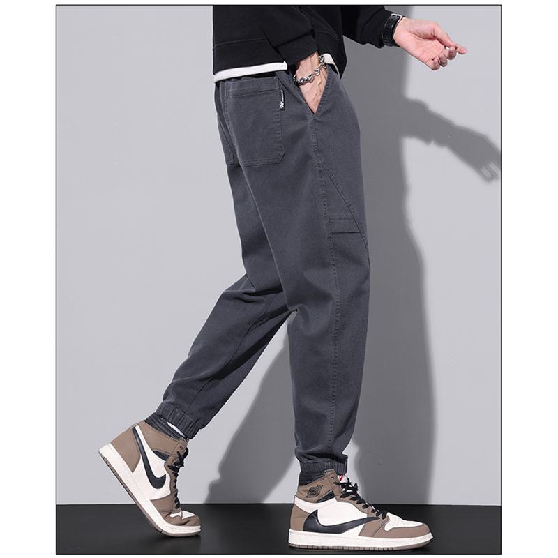 Pantalones de algodón puro con cintura elástica y ajuste holgado y cónico