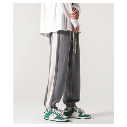 Pantalones casuales de punto de pierna ancha con corte recto y cintura ajustable tipo deportivo