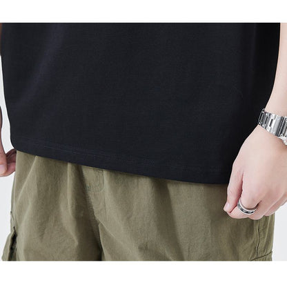 Tee-shirt simple en coton pur à manches courtes, confortable et polyvalent avec col rond.