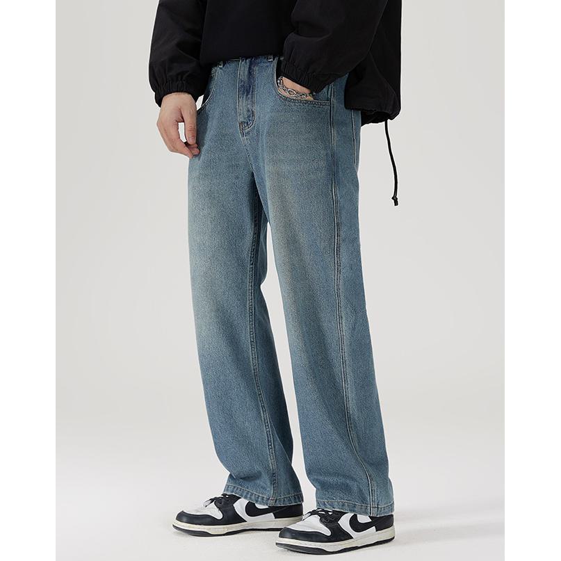 Pantalones de pierna recta sueltos y casuales con cintura elástica y abertura en el dobladillo.