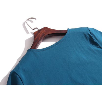 Lockeres, weites T-Shirt aus reiner Baumwolle mit V-Ausschnitt und Kurzarm, bestickt