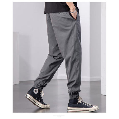 Pantalons de haute qualité, coupe ample et fuselée, polyvalents et élastiques.