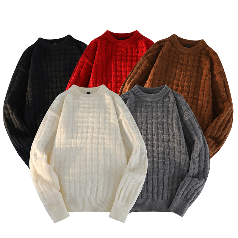 Pull tricoté décontracté à encolure ras du cou et coupe ample.