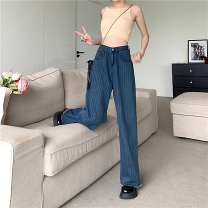 Pantalon rétro à taille haute et jambes larges, ample et doté de poches droites, idéal pour le travail et affinant la silhouette.
