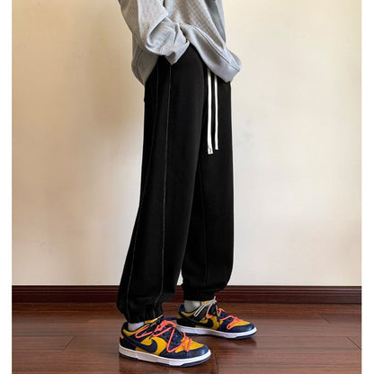 Pantalon de survêtement tricoté ample, droit et fuselé