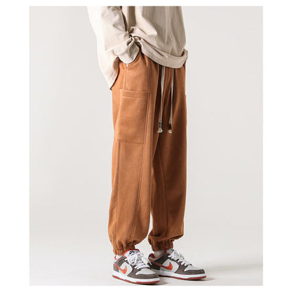 Pantalon polyvalent en simili daim avec cordon de serrage fuselé