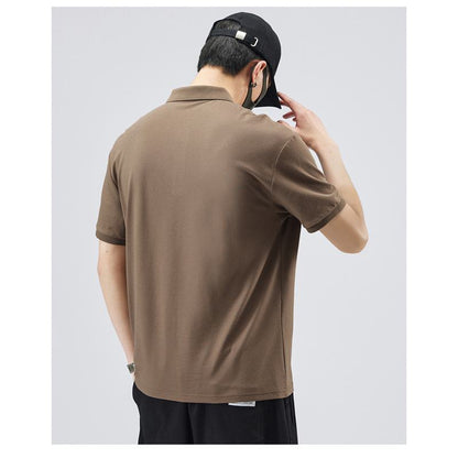 Kurzarm-Poloshirt aus reiner Baumwolle mit Reverskragen, schlicht, schick und qualitativ hochwertig.