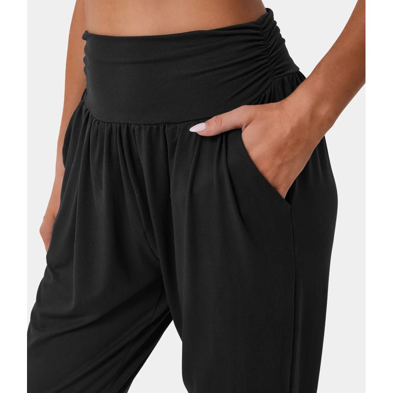 Sportliche, lockere Hose mit hoher Taille, lässigen Taschen, Kordelzug und Falten für Yoga.