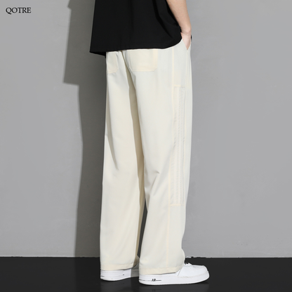 Pantalon de survêtement ample à coupe droite classique qui affine la silhouette