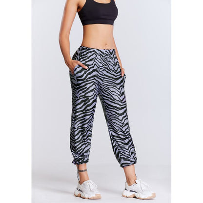 Pantalones deportivos estampados de ajuste holgado y elástico para yoga y running.