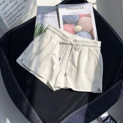 Hochgeschnittene, lässige, locker sitzende Sportshorts mit elastischem Bund und Fischschuppenmuster