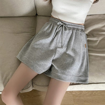 Lässige, lockere Baumwoll-Shorts mit weitem Bein, Taschen und elastischem Bund