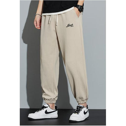 Tapered Strick-Sport-Sweatpant mit elastischem Bund