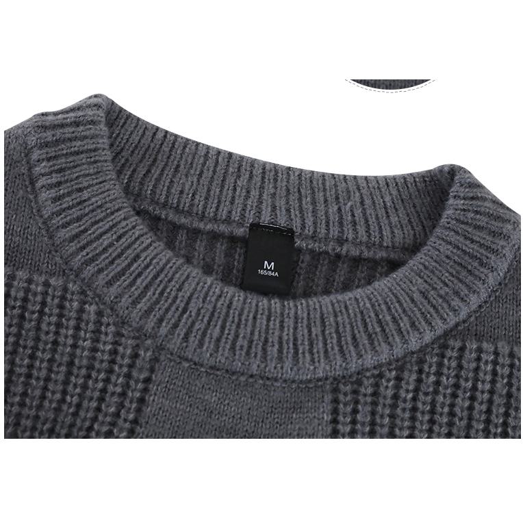 Suéter de punto de cuello redondo de ajuste holgado y estilo sencillo.
