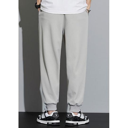 Pantalón deportivo de moda de punto con corte ajustado y suelto