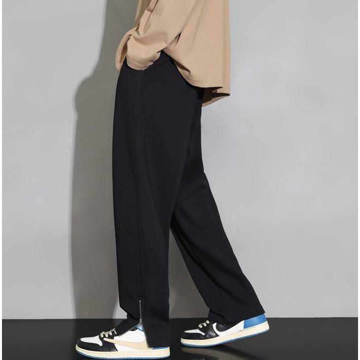 Pantalones de punto con cremallera, pierna recta, corte suelto y dobladillo dividido