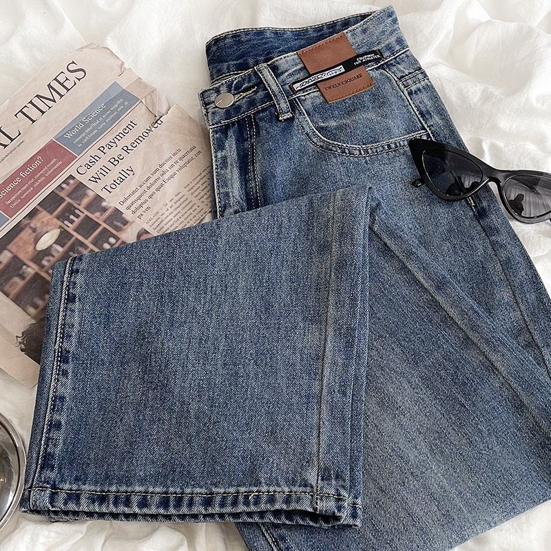 Jeans retro de pierna ancha, cintura alta y largo hasta el suelo informal.