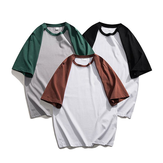 Cómoda camiseta de manga corta de cuello redondo y hombros caídos en color sólido y suave.