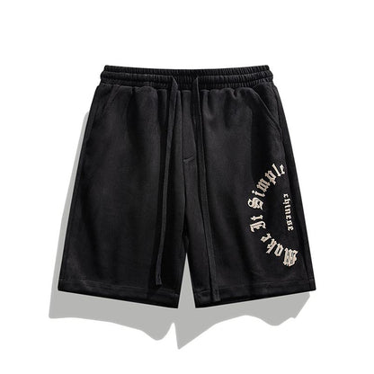 Weite Velours-Shorts in Kamelhaar-Farbe mit elastischem Bund, Kordelzug und vielseitigem Muster.