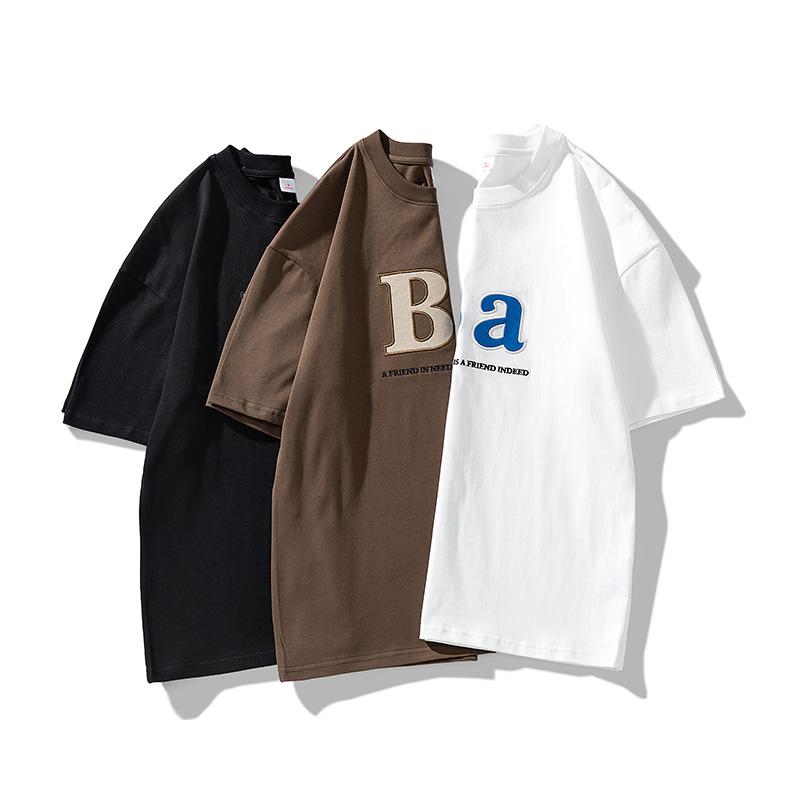 Camiseta de manga corta de algodón puro con estampado de letras y corte holgado.