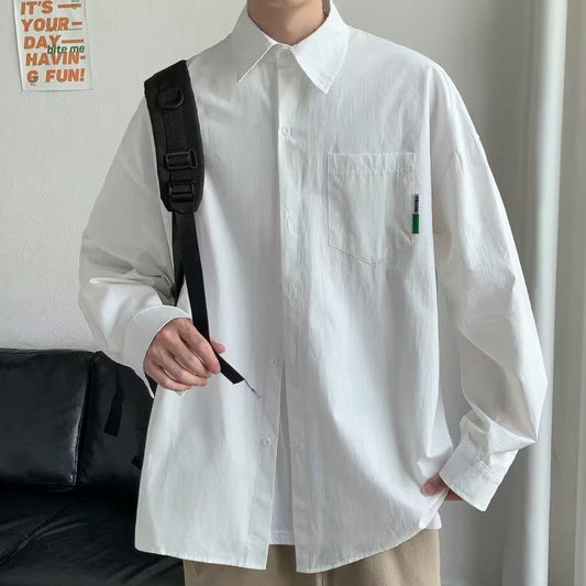 Camisa de manga larga con botones y bolsillo remendado