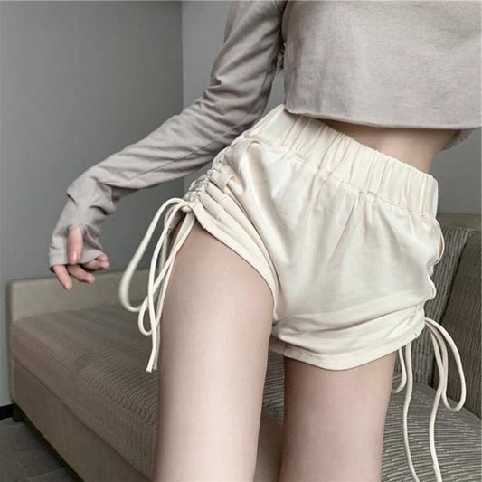 Pantalones cortos deportivos versátiles con cordón en la cintura alta