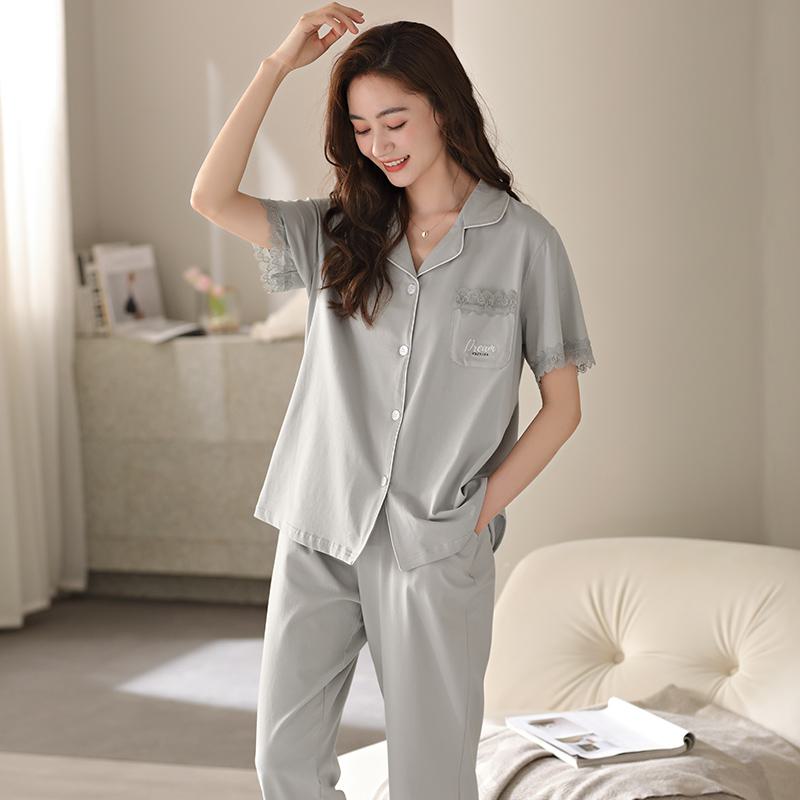 Ensemble de pyjama en coton pur à manches courtes avec boutons sur le devant, poche et couleur unie avec Lycra.