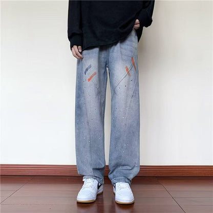 Jeans retro de patchwork recto versátil con grafiti de salpicaduras de tinta