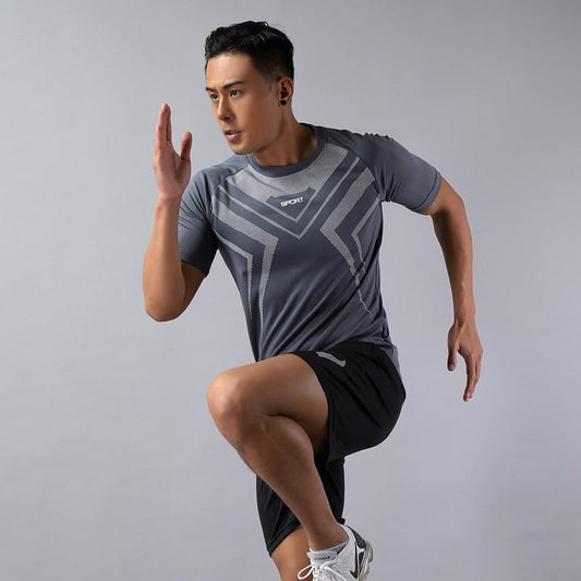 Conjunto deportivo de ropa deportiva de secado rápido y suelto para correr casualmente y hacer ejercicio físico.