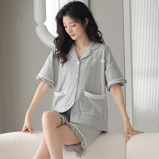 Conjunto de pijama de lycra con cierre de botones delanteros, bolsillo y cuello jacquard