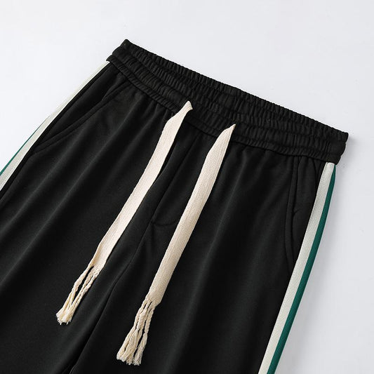 Pantalon de survêtement ample à taille élastique et coupe droite polyvalent pour le sport