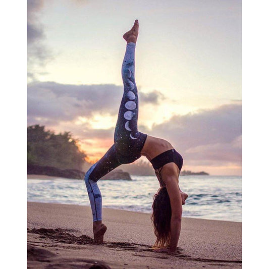Leggings deportivos de yoga de secado rápido con colores contrastantes y degradado de cintura alta para exteriores.
