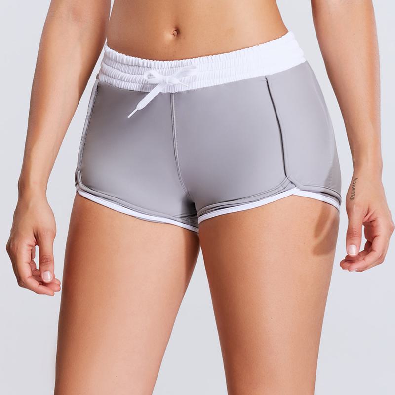 Pantalones cortos deportivos ajustados de yoga transpirables y elásticos