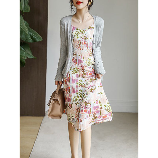Vestido estampado floral de estilo francés con cintura ajustada y mangas de burbuja únicas que adelgazan.