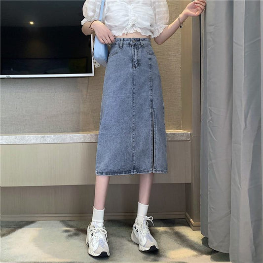 Falda de mezclilla con cintura alta y dobladillo dividido en línea A