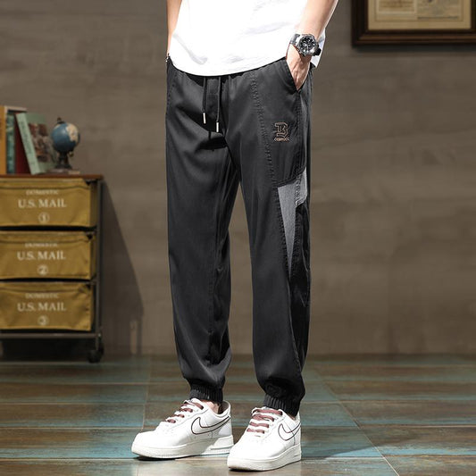 Pantalones cónicos de lyocell ligeros y versátiles con cintura elástica de tencel.