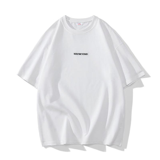 Camiseta de manga corta de algodón puro con cuello redondo y ajuste holgado de estilo casual y moderno.