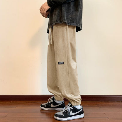 Pantalon de survêtement décontracté à coupe ample et ajustée, style urbain tricoté.