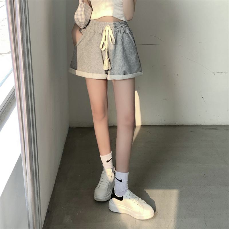 Shorts de algodón de moda con cordón y bolsillos de pierna ancha
