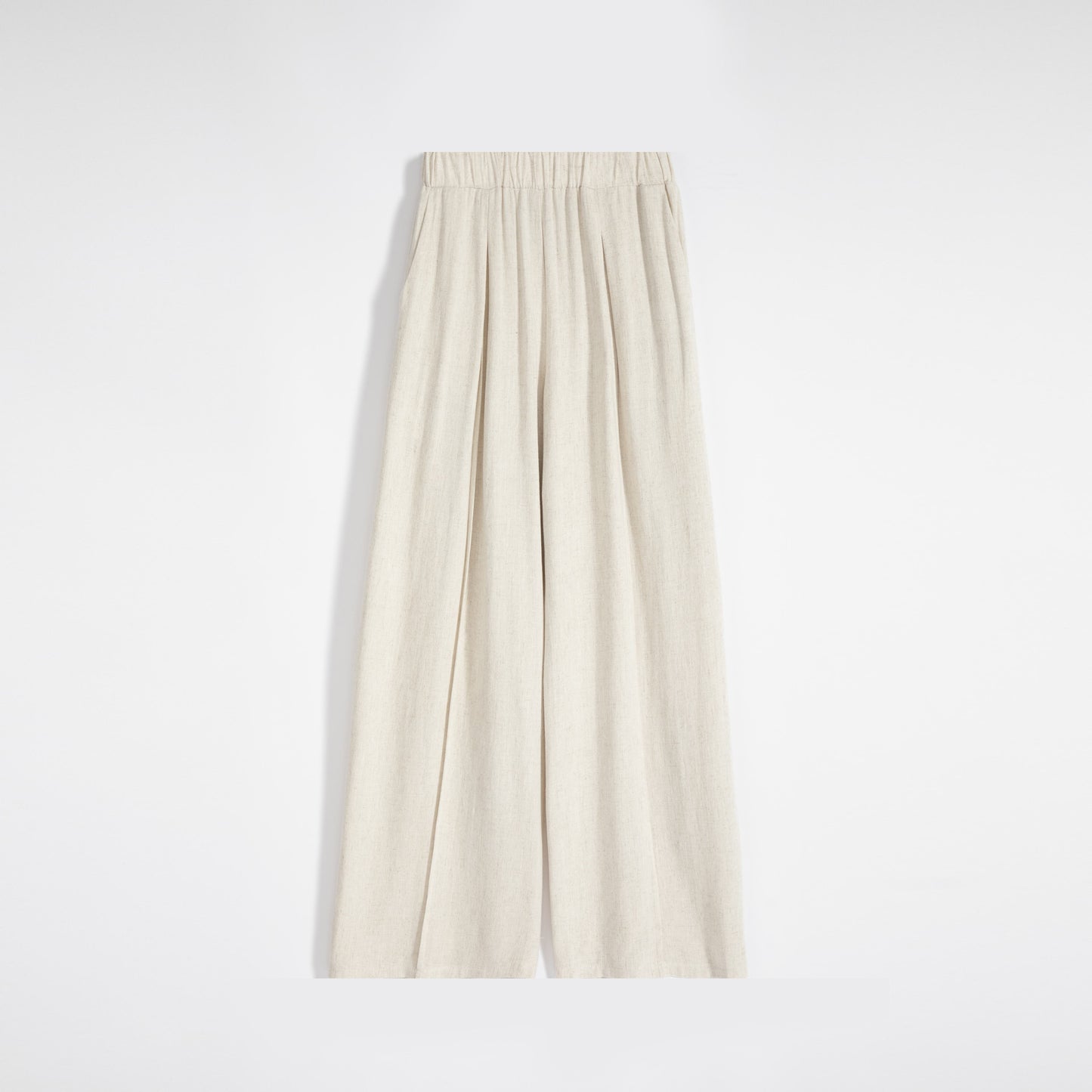 Pantalon ample en lin soyeux à taille haute et coupe décontractée.