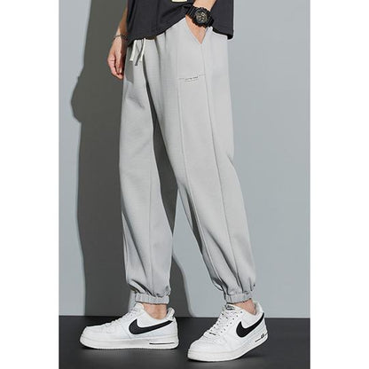 Tapered Knitted Slant Pocket Solid Color Sweatpant