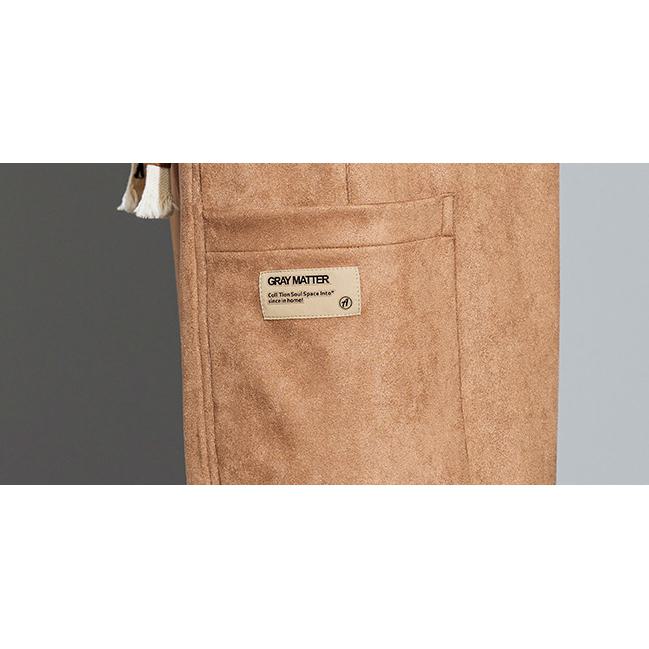 Pantalón de sudadera versátil de gamuza con cordón ajustable y bolsillo acordeón cónico